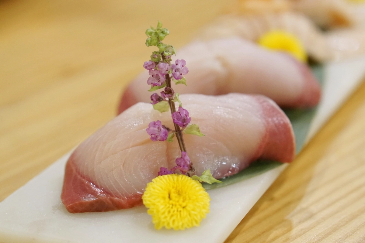 Fresh Hamachi Nigiri with Floral Garnish