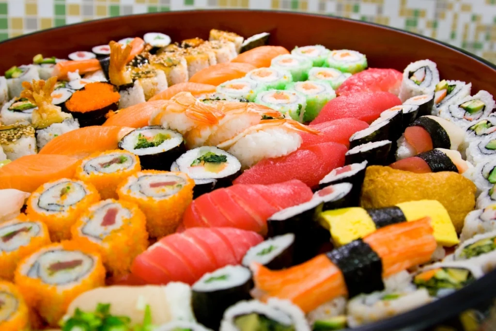 Assorted Sushi Platter with Hamachi, Nigiri, and Rolls