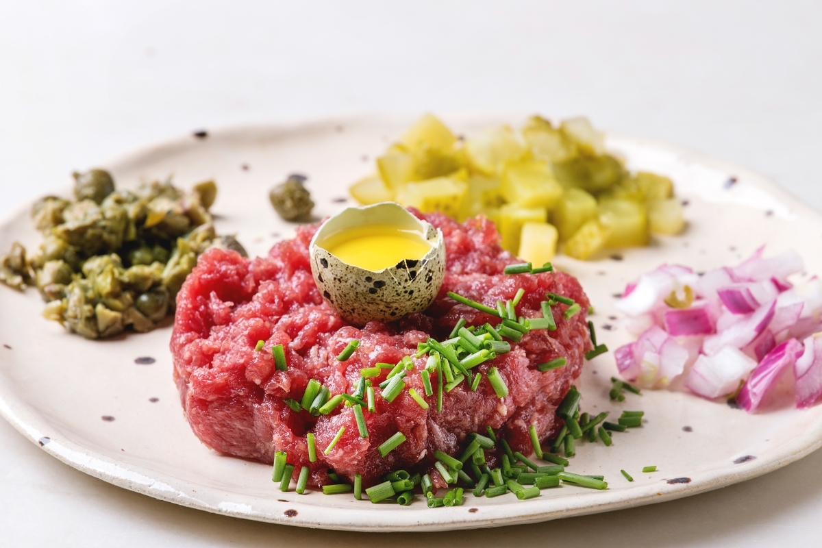 Beef tartare with quail egg and fresh herbs